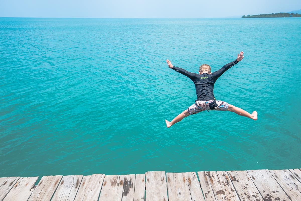 deck jumping one boy telunas-beach-resort_44766276545_o